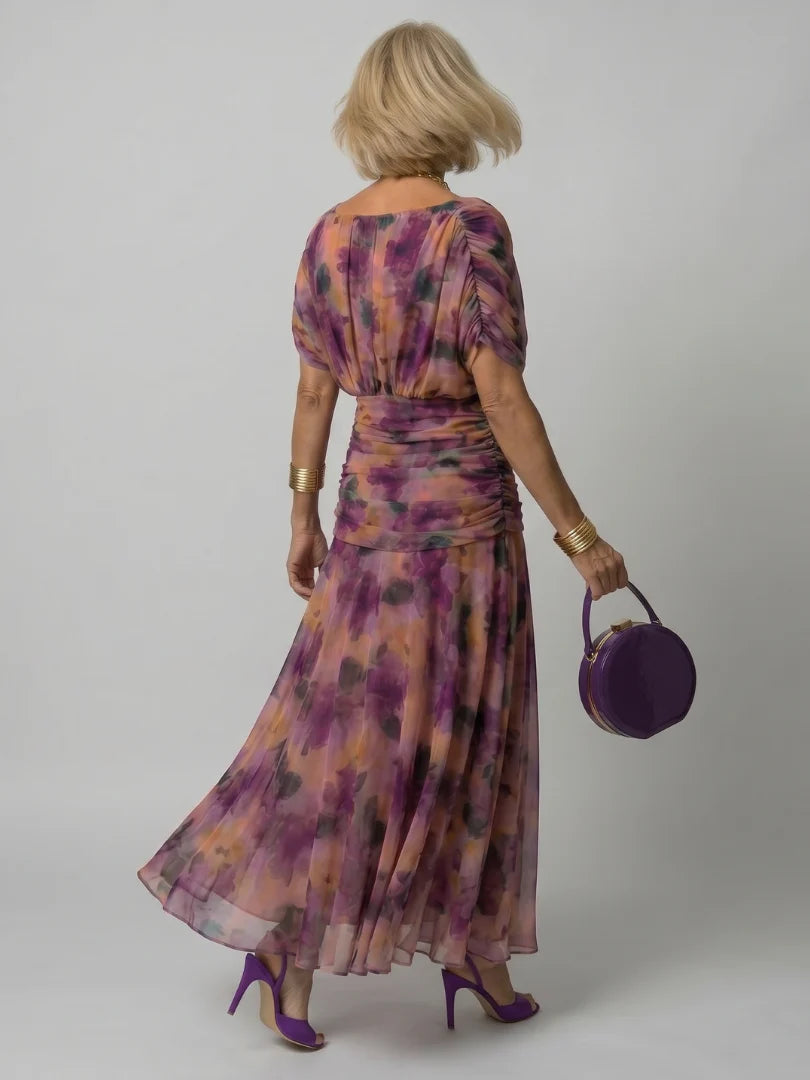 Saskia | Soepelvallende midi-jurk met blote schouders