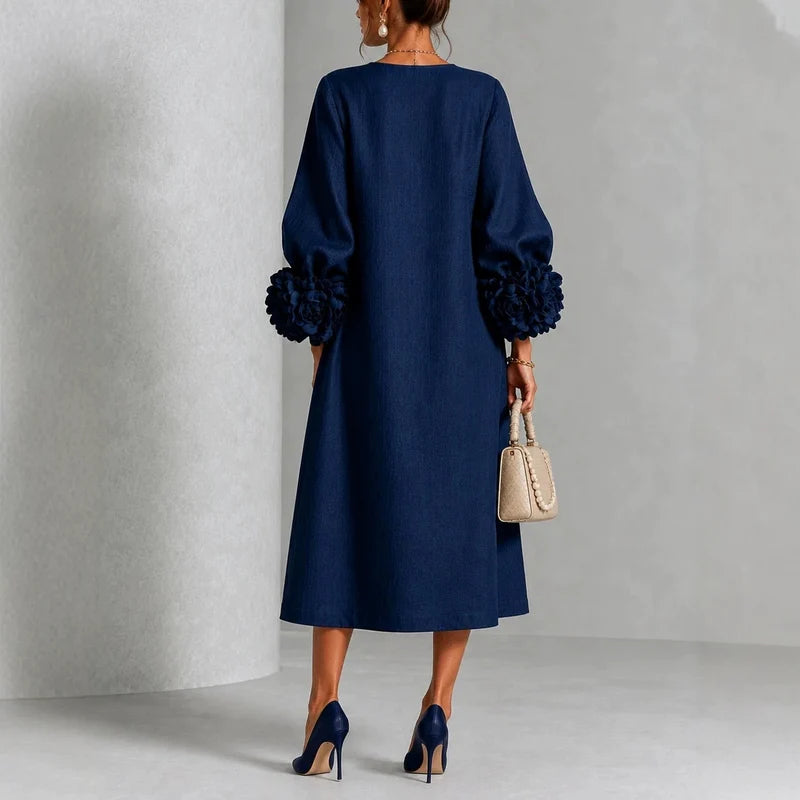 Marit | Midi-jurk met bloemenprint en mouwen met roosvormige manchetten