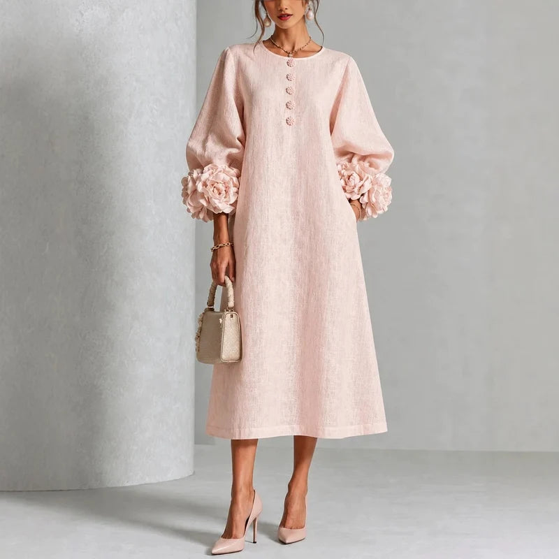 Marit | Midi-jurk met bloemenprint en mouwen met roosvormige manchetten
